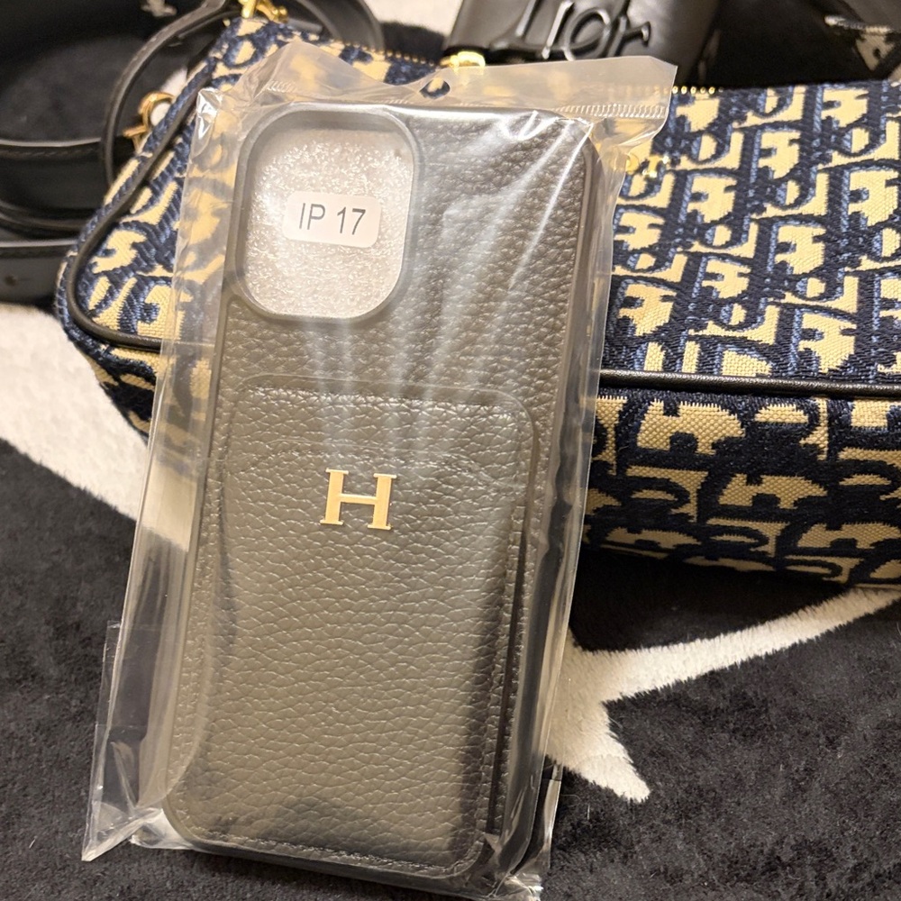 Black leather 17 I Phone Case with Card Holder. H logo. New